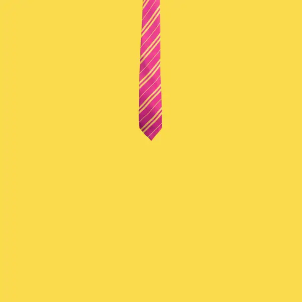 A pink striped school tie on a yellow background